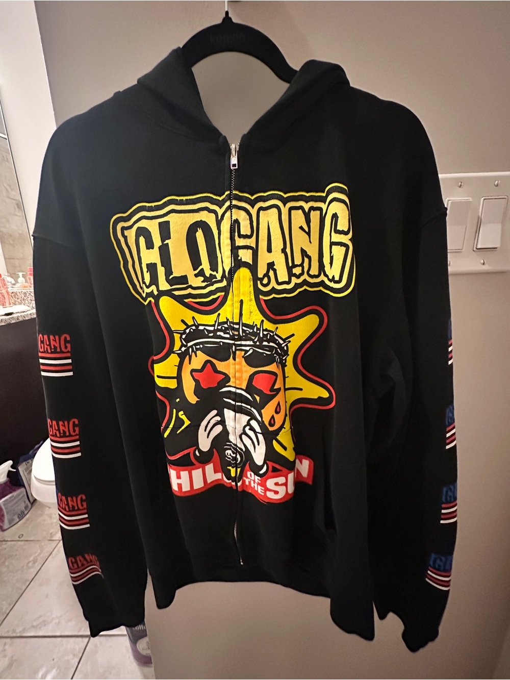 The Glorious Glo Gang Black Zip Hoodie with Yellow & Red Graphic